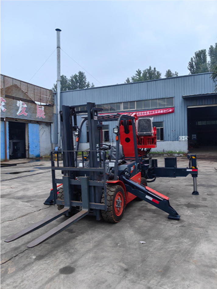 Folding arm tail boom crane